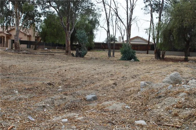 a view of house with trees in the background