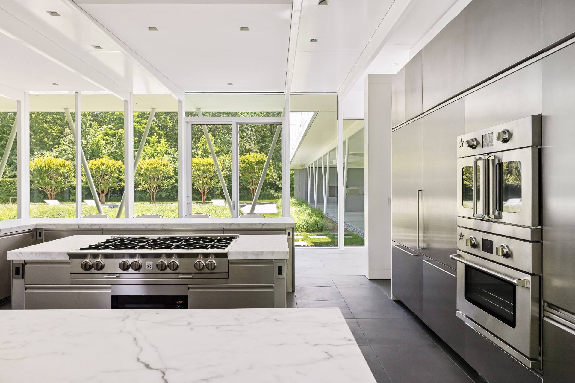13 Terry's Trail East Hampton, NY 11937 - Photo 26 of 46 a kitchen with stainless steel appliances a stove a sink and a refrigerator