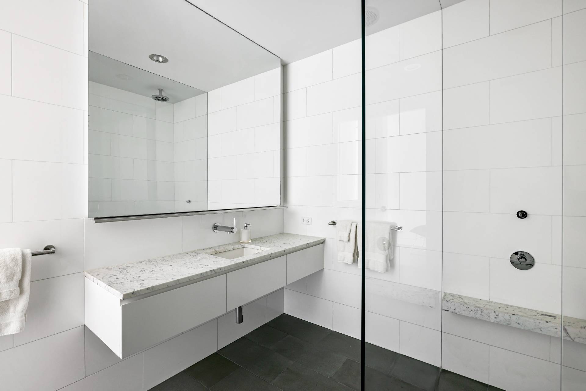 13 Terry's Trail East Hampton, NY 11937 - Photo 39 of 46 a bathroom with a sink and a mirror