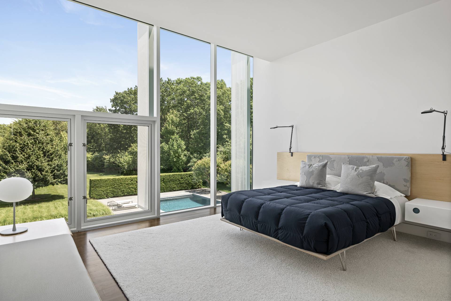 13 Terry's Trail East Hampton, NY 11937 - Photo 40 of 46 a bedroom with a bed and a large window