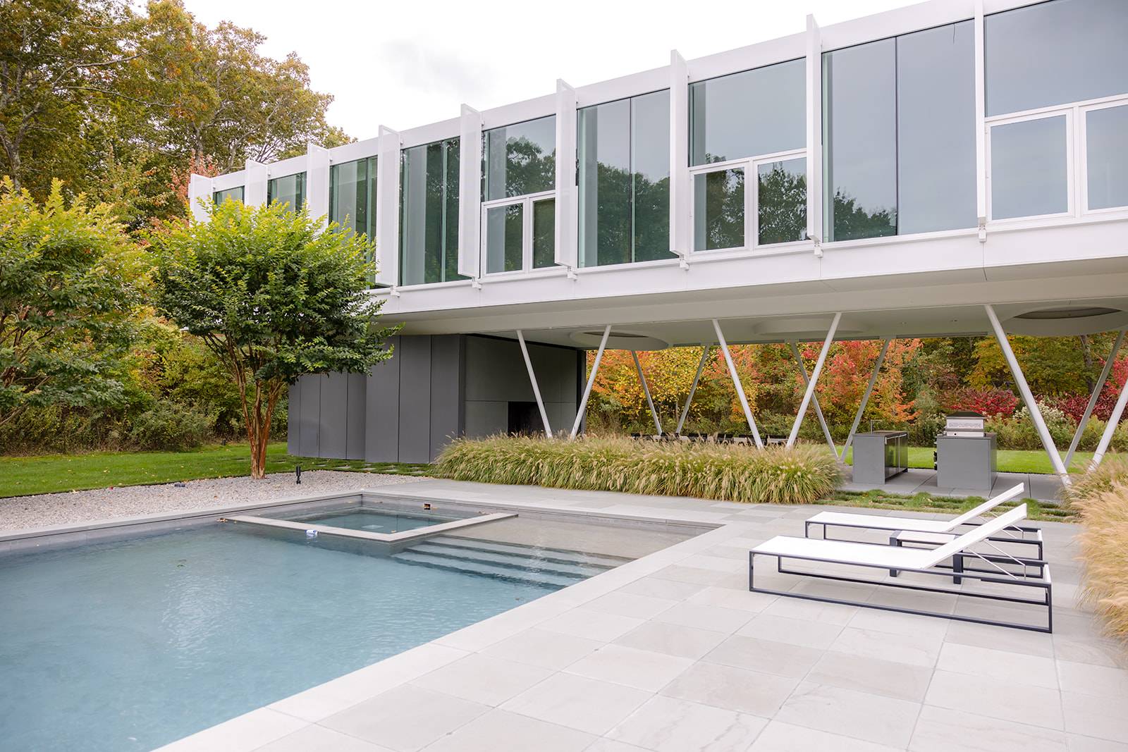 13 Terry's Trail East Hampton, NY 11937 - Photo 41 of 46 a front view of a house with a yard