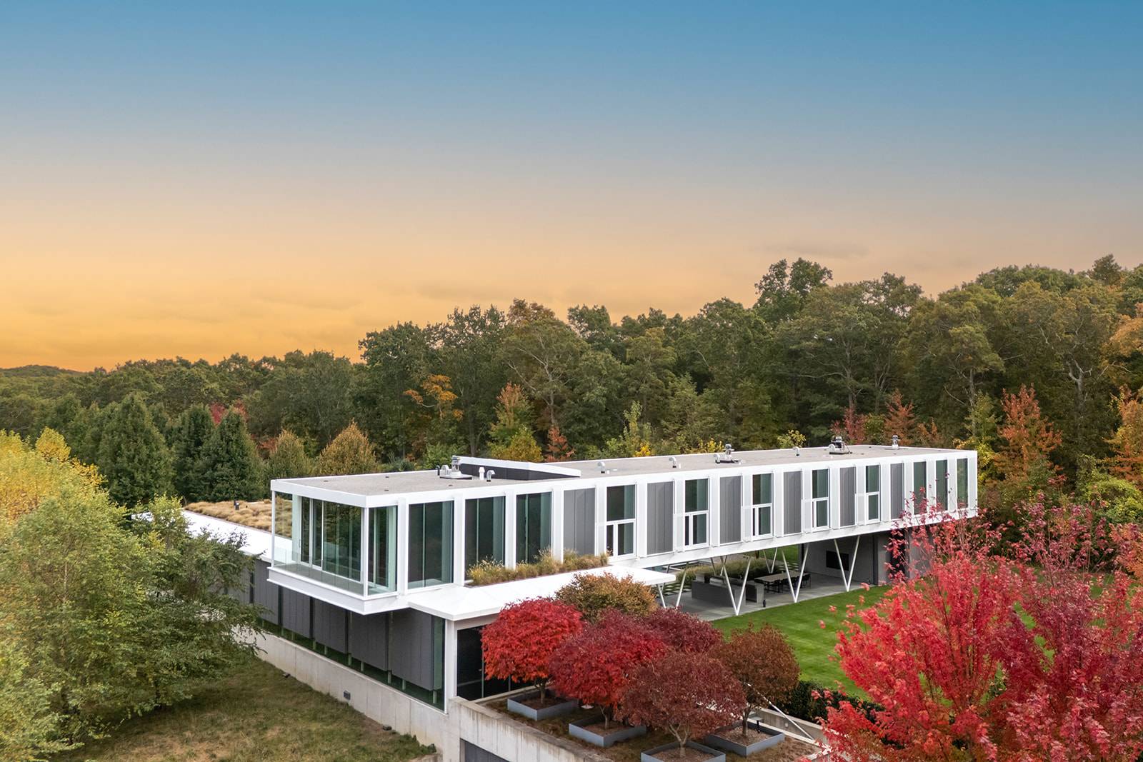 13 Terry's Trail East Hampton, NY 11937 - Photo 44 of 46 a view of a house with a yard and sitting area