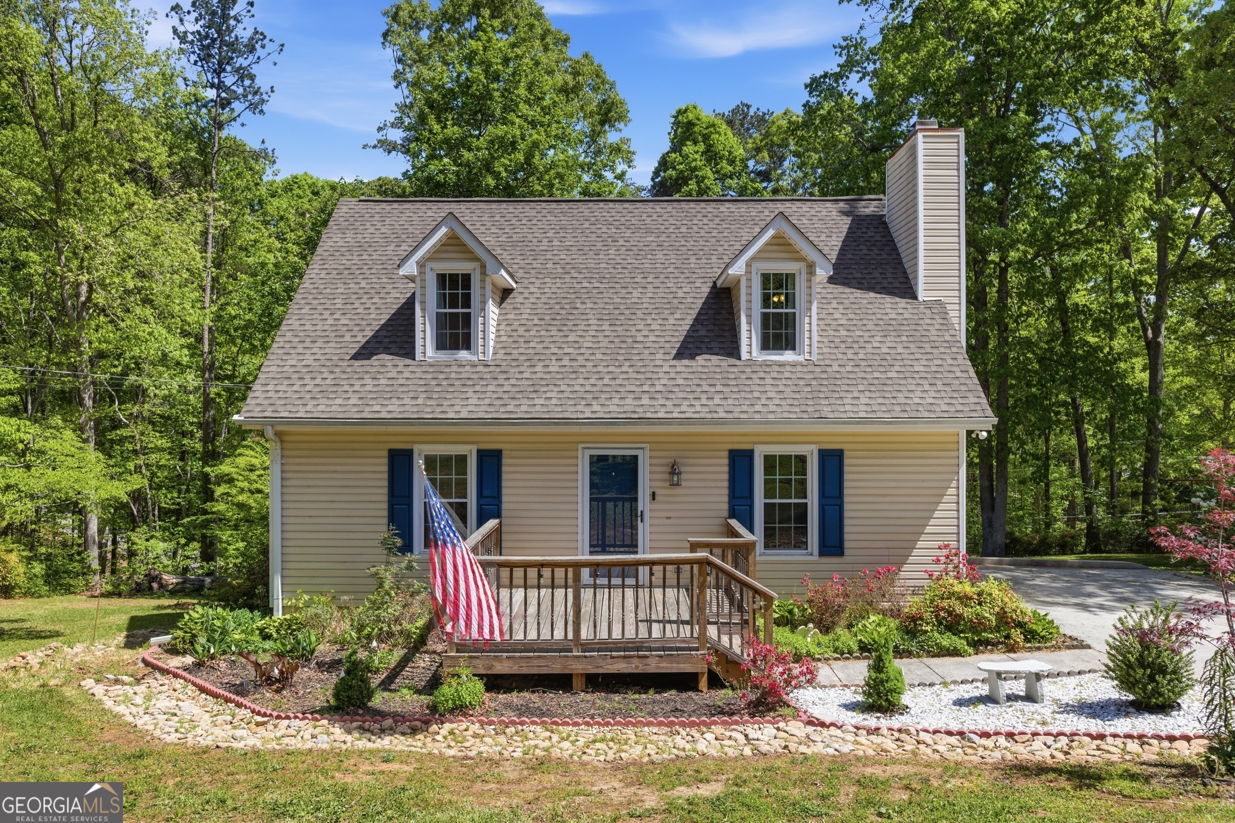 front view of a house with a yard