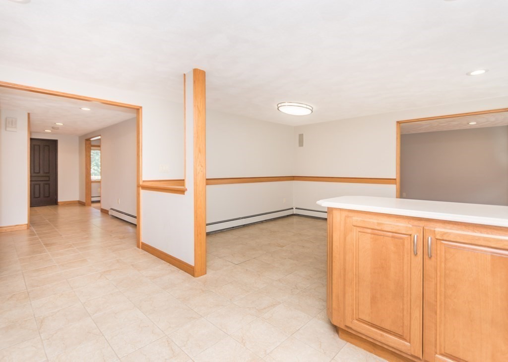 129 Beal Road Waltham, MA 02453 - Photo 12 of 31 a view of a kitchen with an entryway