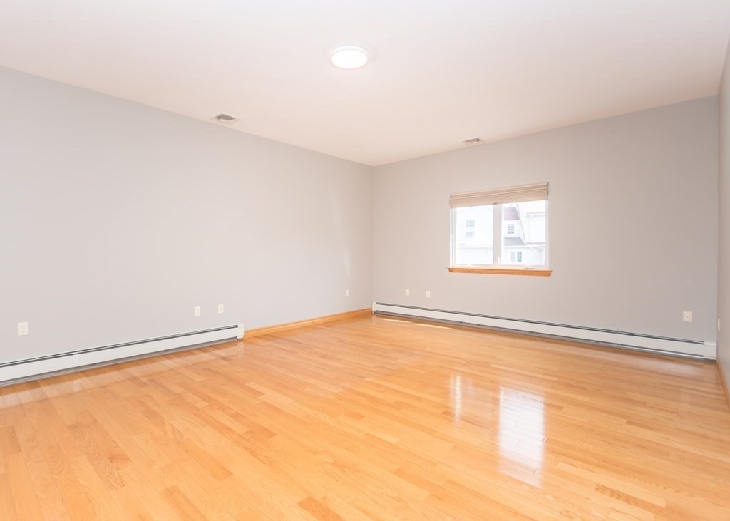 129 Beal Road Waltham, MA 02453 - Photo 17 of 31 an empty room with a empty space and a window