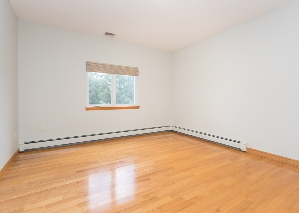 129 Beal Road Waltham, MA 02453 - Photo 23 of 31 an empty room with a window