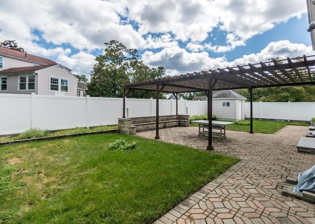 129 Beal Road Waltham, MA 02453 - Photo 29 of 31 a view of a backyard with sitting area