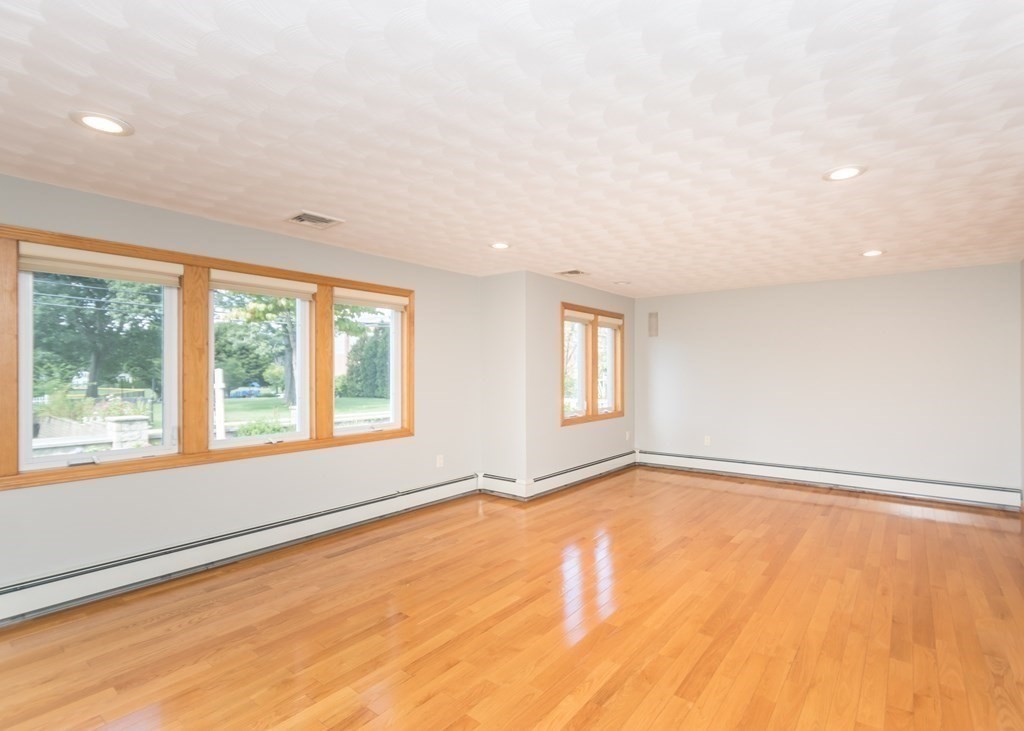 129 Beal Road Waltham, MA 02453 - Photo 3 of 31 a view of an empty room with a window