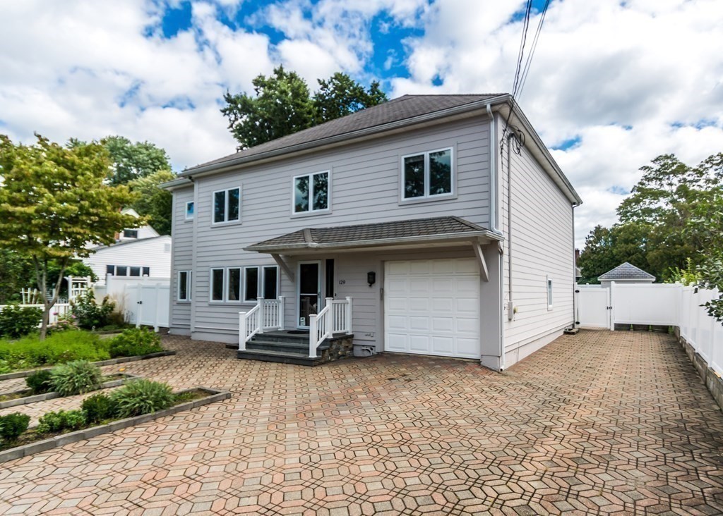 129 Beal Road Waltham, MA 02453 - Photo 31 of 31 a front view of a house with a garden