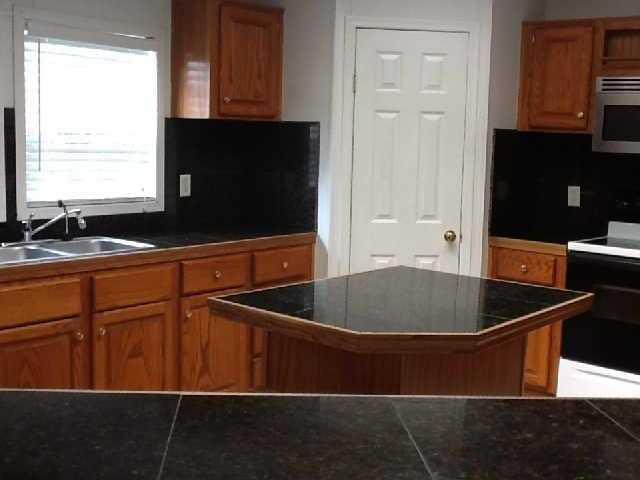 5120 North Lamar Road Mount Juliet, TN 37122 - Photo 3 of 6 Kitchen with Granite Tile View from Pass Through in LR