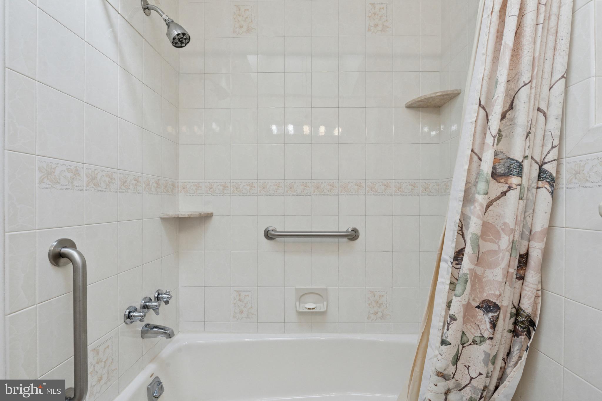 7026 Crease Lane Philadelphia, PA 19128 - Photo 20 of 41 a bathroom with a bathtub and shower