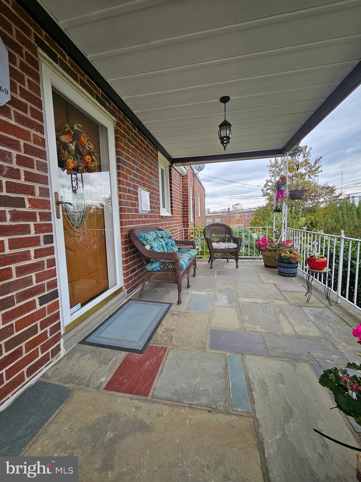 7026 Crease Lane Philadelphia, PA 19128 - Photo 3 of 41 a living room with furniture and a flat screen tv
