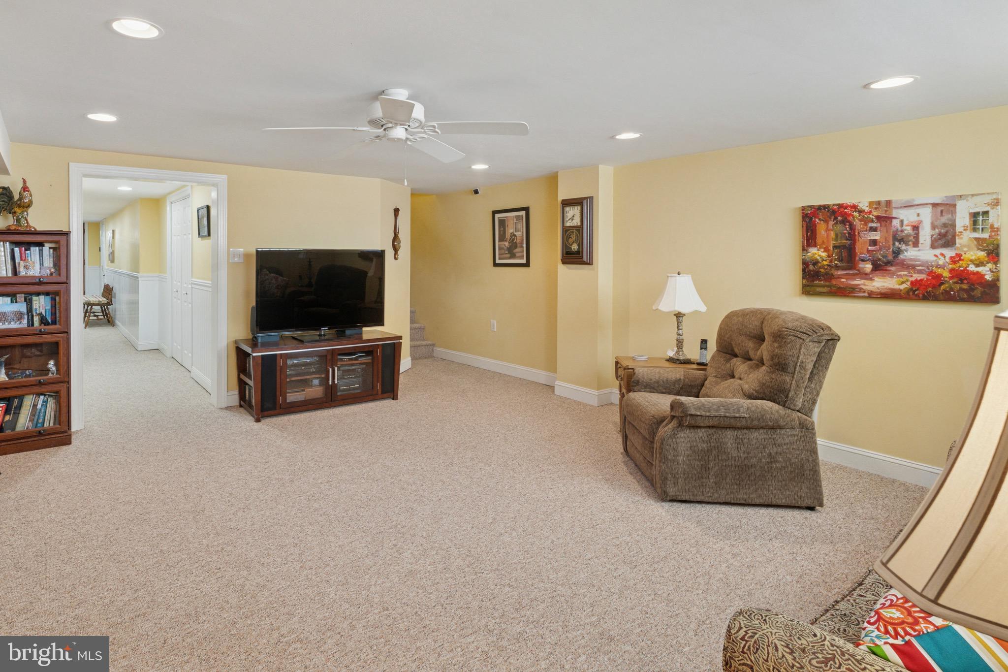 7026 Crease Lane Philadelphia, PA 19128 - Photo 31 of 41 a living room with furniture and a flat screen tv