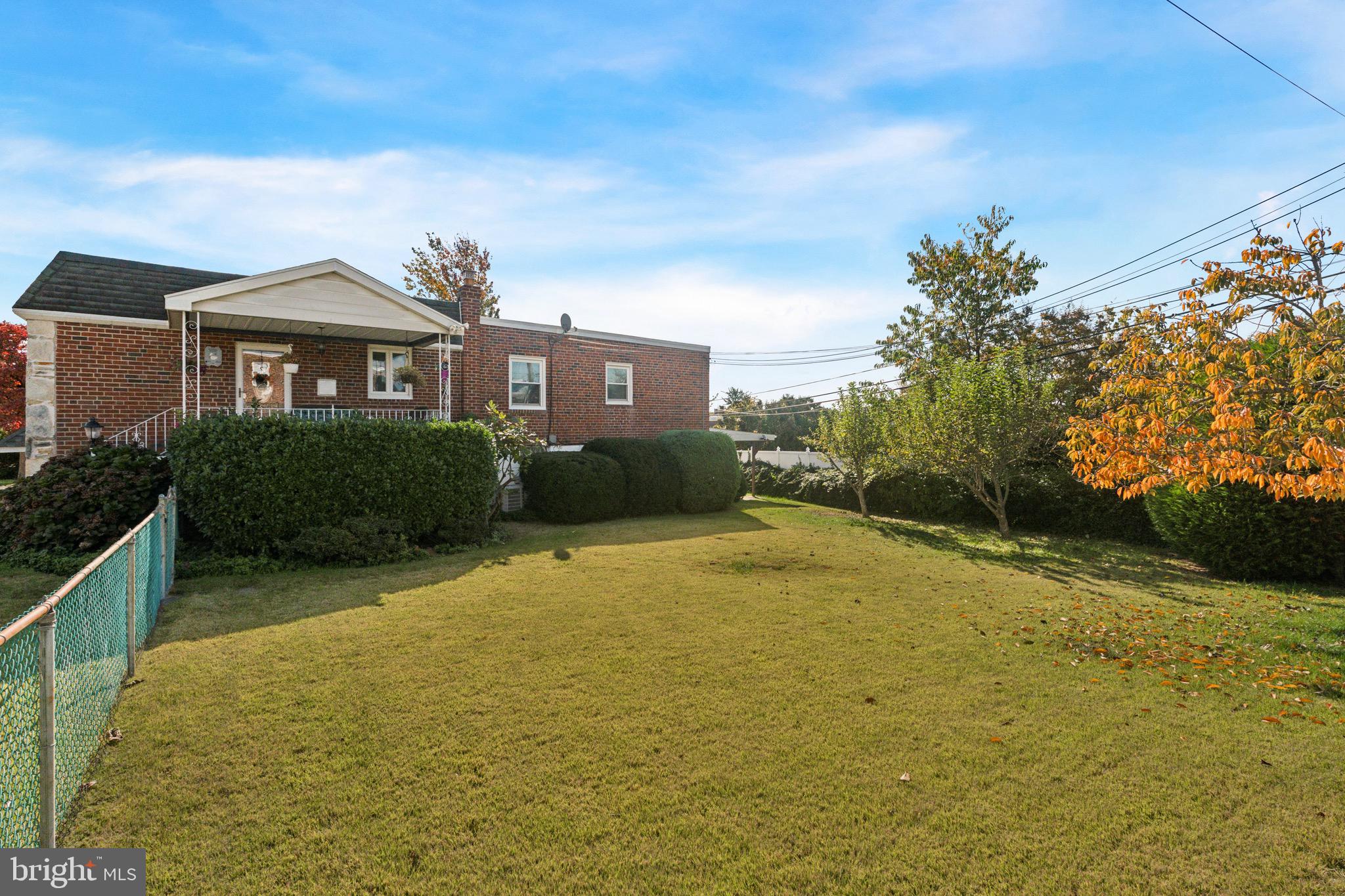 7026 Crease Lane Philadelphia, PA 19128 - Photo 41 of 41 a front view of a house with a yard