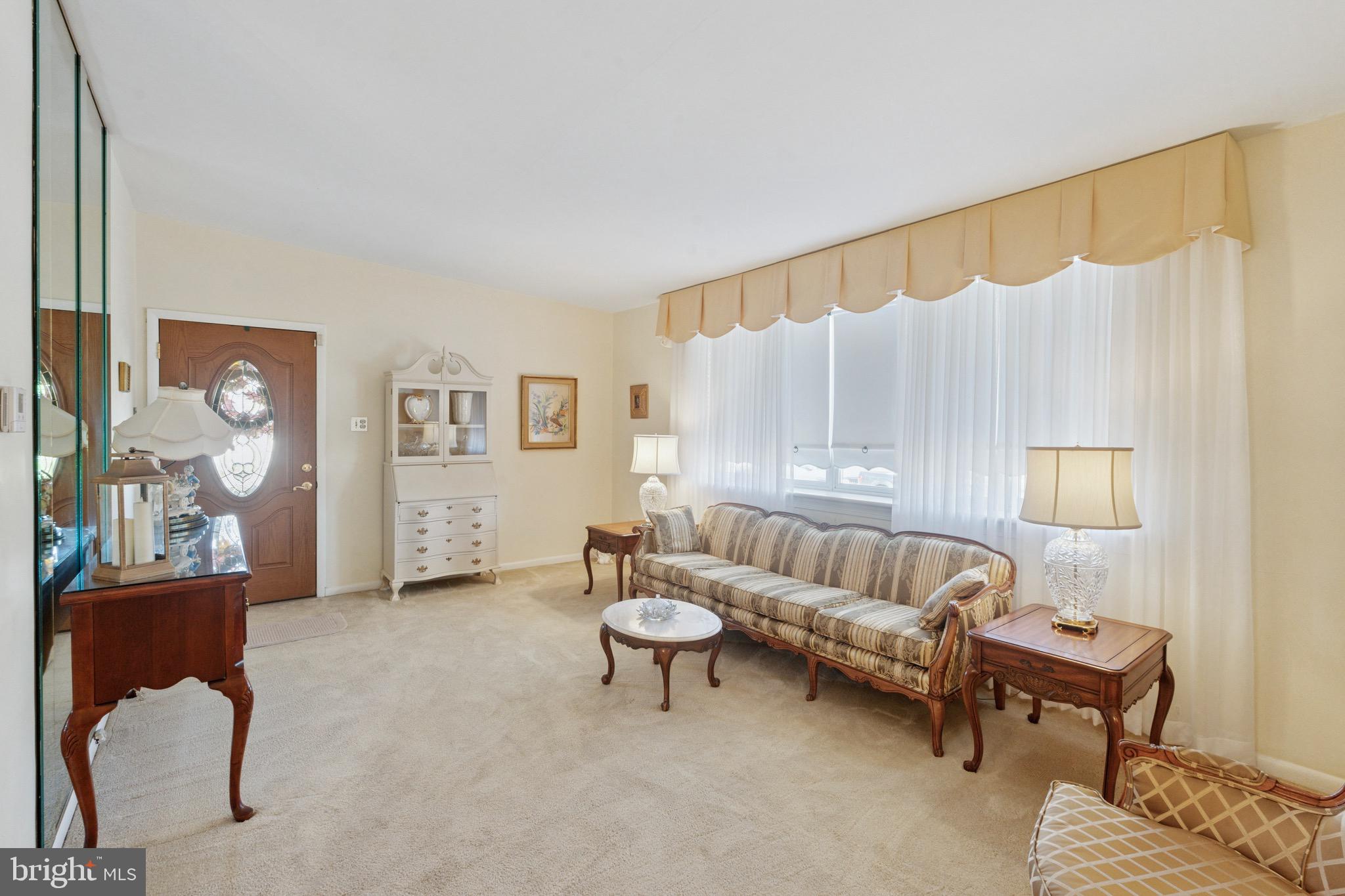 7026 Crease Lane Philadelphia, PA 19128 - Photo 7 of 41 a living room with furniture and a couch