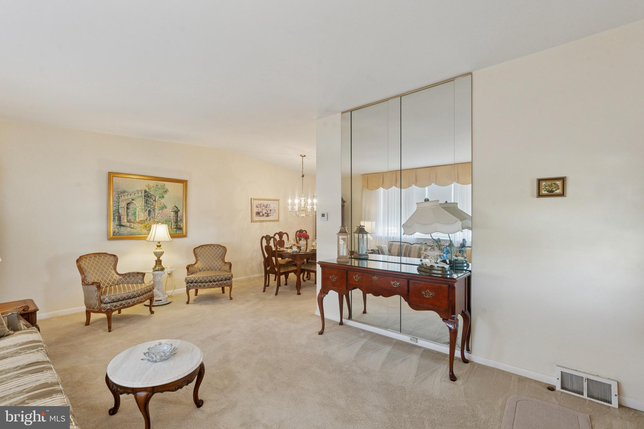 7026 Crease Lane Philadelphia, PA 19128 - Photo 9 of 41 a living room with furniture a rug and a large window