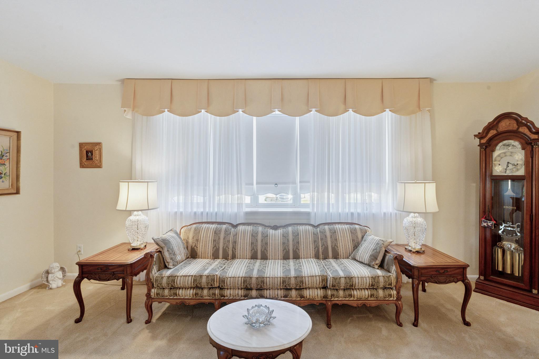 7026 Crease Lane Philadelphia, PA 19128 - Photo 10 of 41 a living room with furniture and a lamp