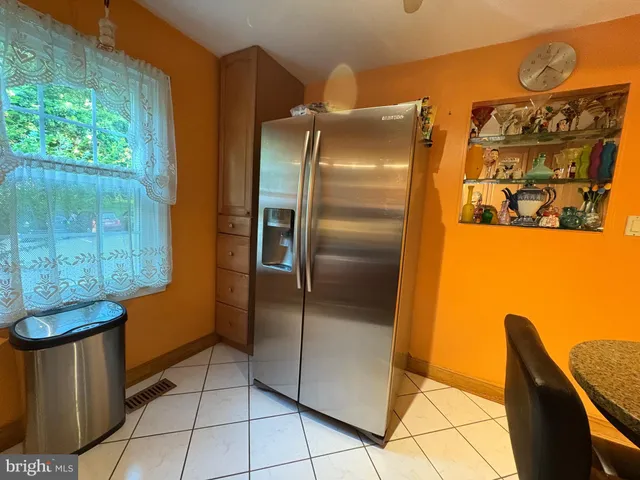 a kitchen with a stove and a microwave