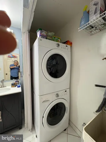 a view of a chair and table in the patio