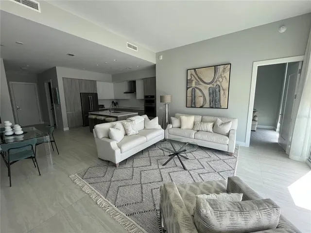 swimming pool view with a seating space