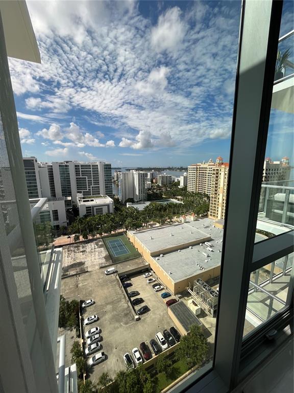 301 Quay Commons, Unit 1808 Sarasota, FL 34236 - Photo 9 of 12 swimming pool view with a seating space