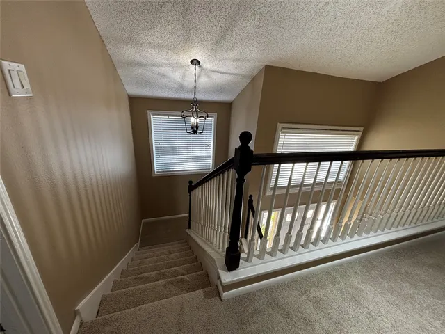 a view of backyard with a garden