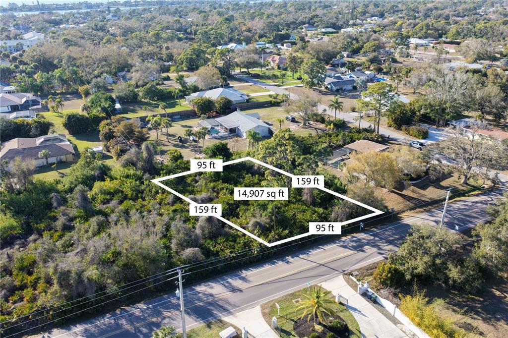 0 Manasota Beach Road Englewood, FL 34223 - Photo 2 of 4 an aerial view of a house with a yard