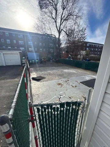 a view of balcony and wooden floor