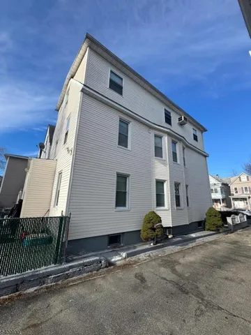 a house view with a backyard space