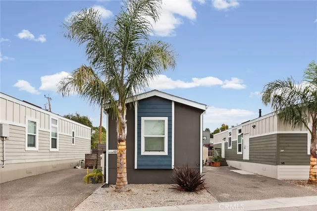 a house with a tree in front of it