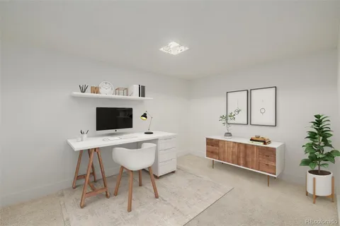 a workspace with furniture and window