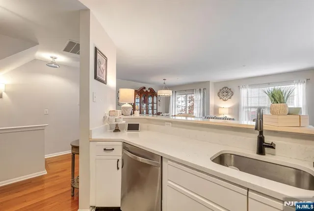 a kitchen with a sink and a window