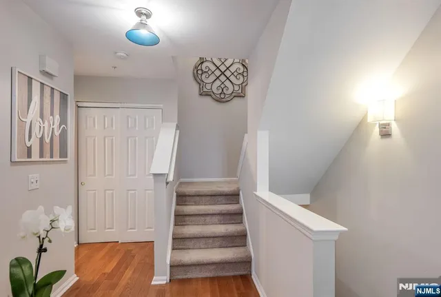 a view of entryway with wooden floor