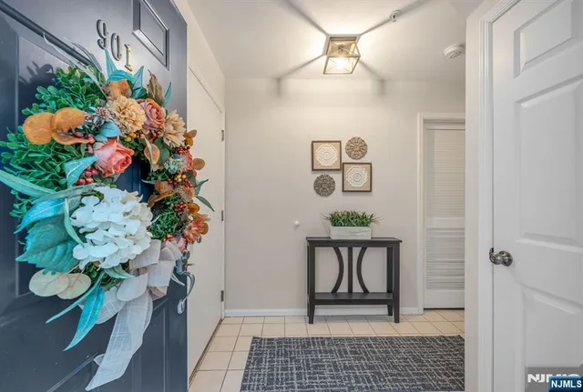 a view of entryway with wooden floor