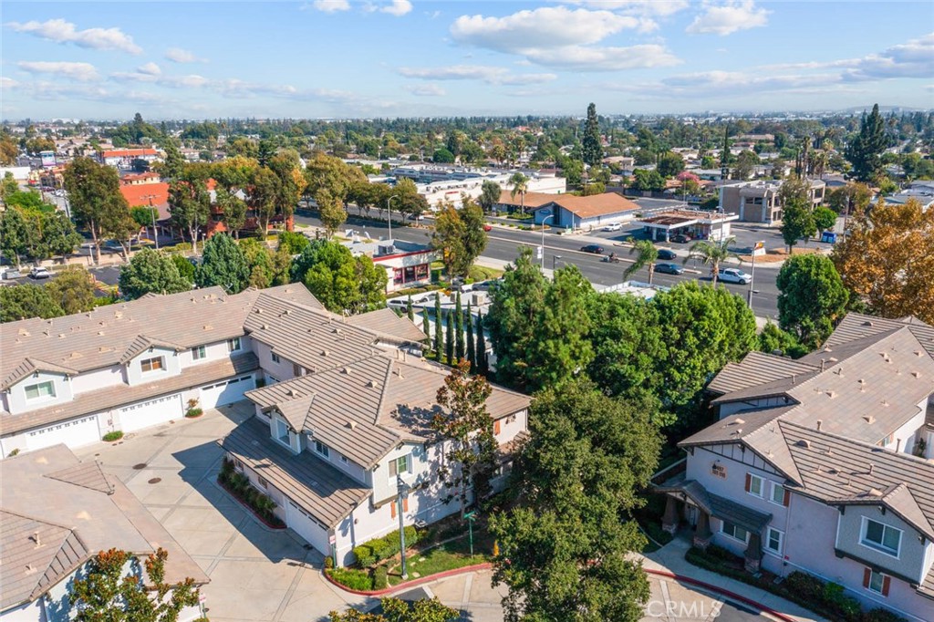 8055 Pueblo Place, Unit 101 Rancho Cucamonga, CA 91730 - Photo 22 of 30 an aerial view of a city with lots of residential buildings