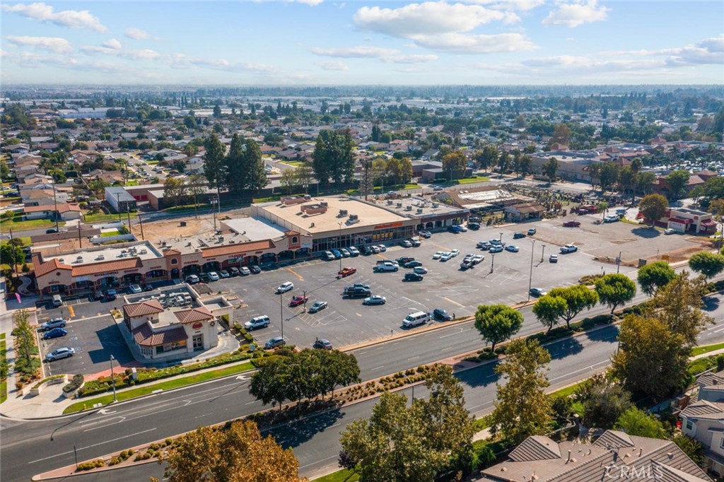 8055 Pueblo Place, Unit 101 Rancho Cucamonga, CA 91730 - Photo 28 of 30 an aerial view of a city with lots of residential buildings