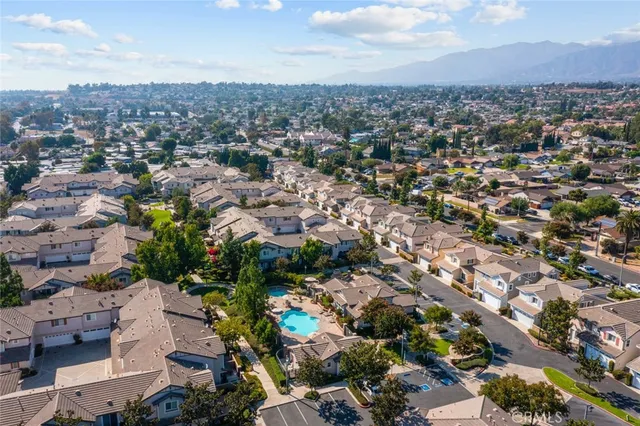 an aerial view of a city with lots of residential buildings
