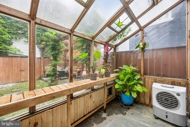 a view of an entryway with sitting area