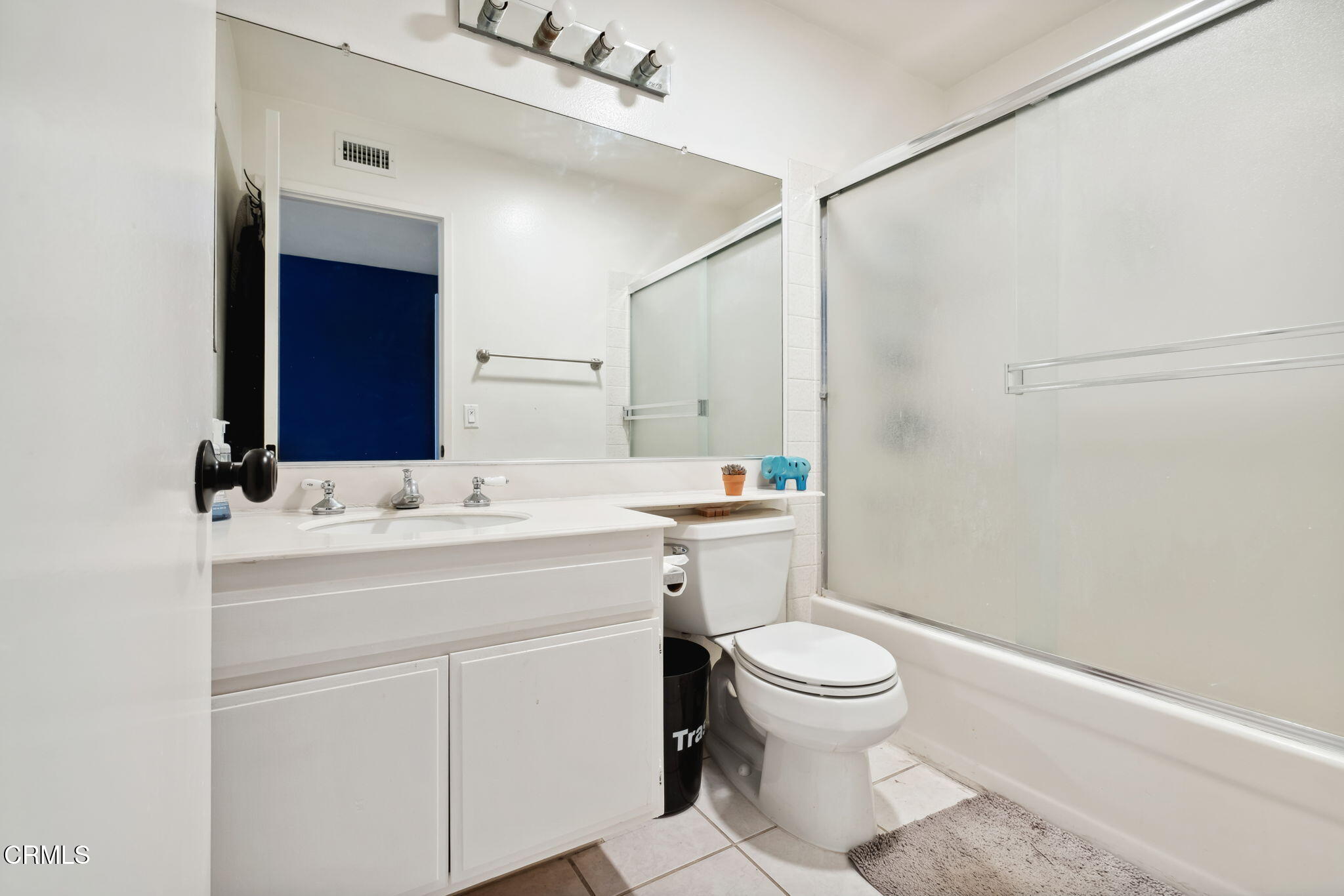 4293 Peach Slope Road Moorpark, CA 93021 - Photo 26 of 36 a bathroom with a sink a toilet and a mirror