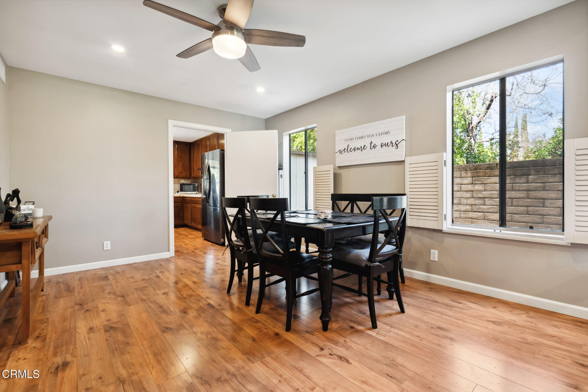 4293 Peach Slope Road Moorpark, CA 93021 - Photo 7 of 36 a view of a dining room with furniture window and wooden floor