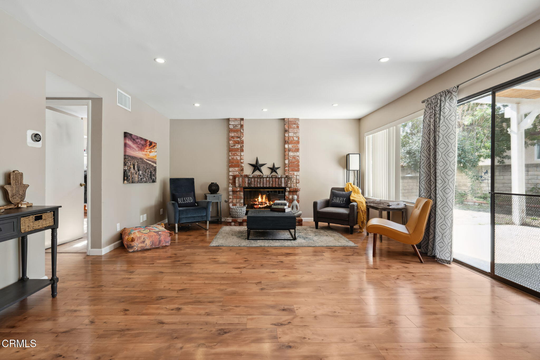 4293 Peach Slope Road Moorpark, CA 93021 - Photo 9 of 36 a living room with furniture window and a flat screen tv