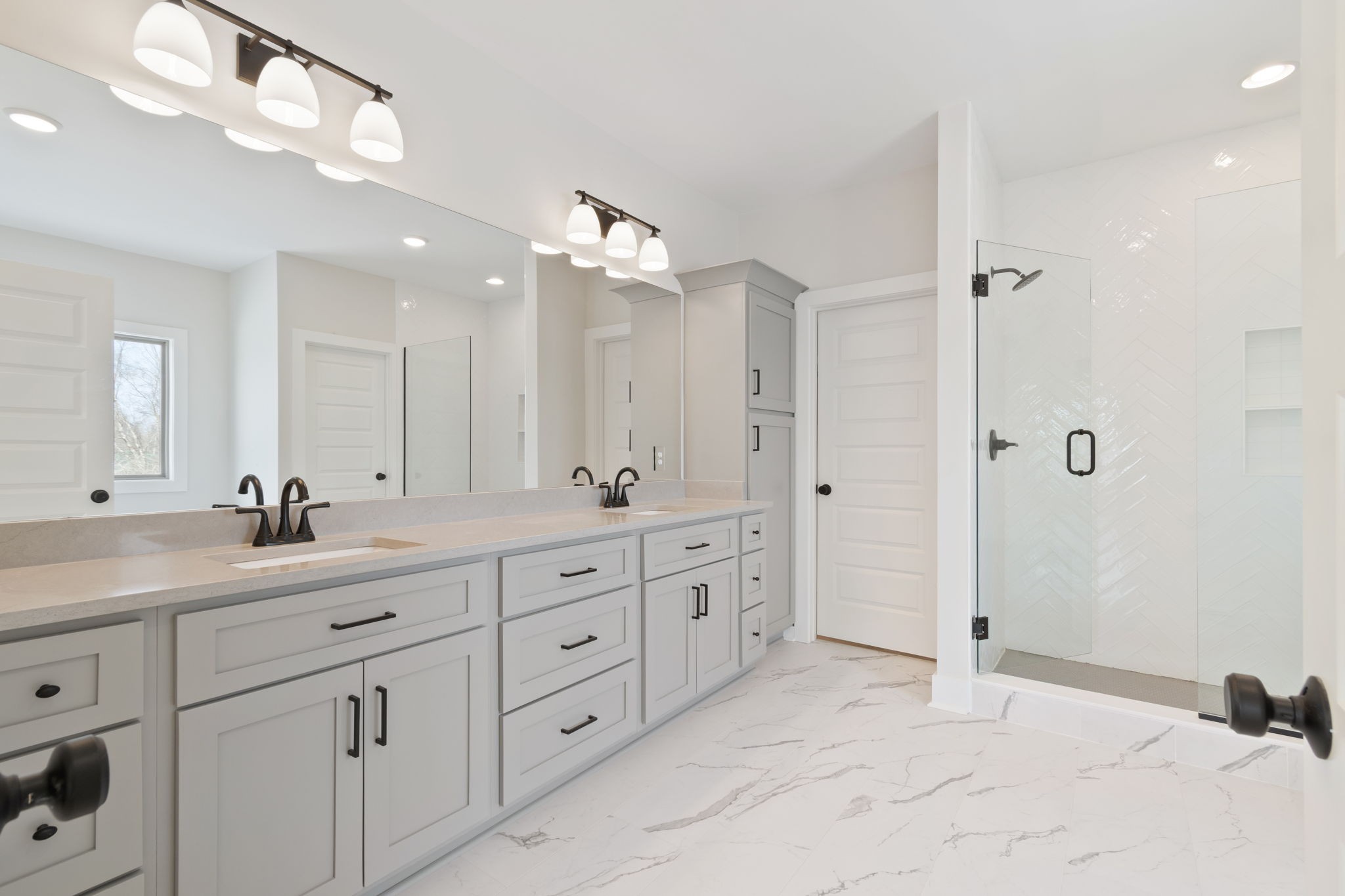 1004 Pheasant Court Spring Hill, TN 37174 - Photo 14 of 22 a bathroom with a granite countertop sink mirror and a shower