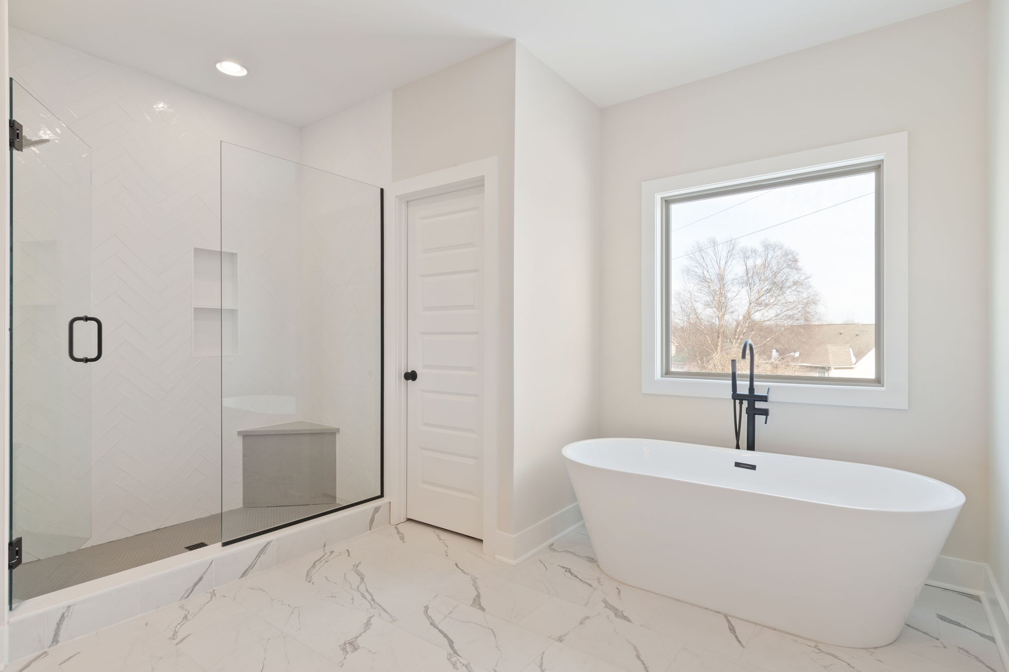 1004 Pheasant Court Spring Hill, TN 37174 - Photo 15 of 22 a bathroom with a sink a window and a mirror