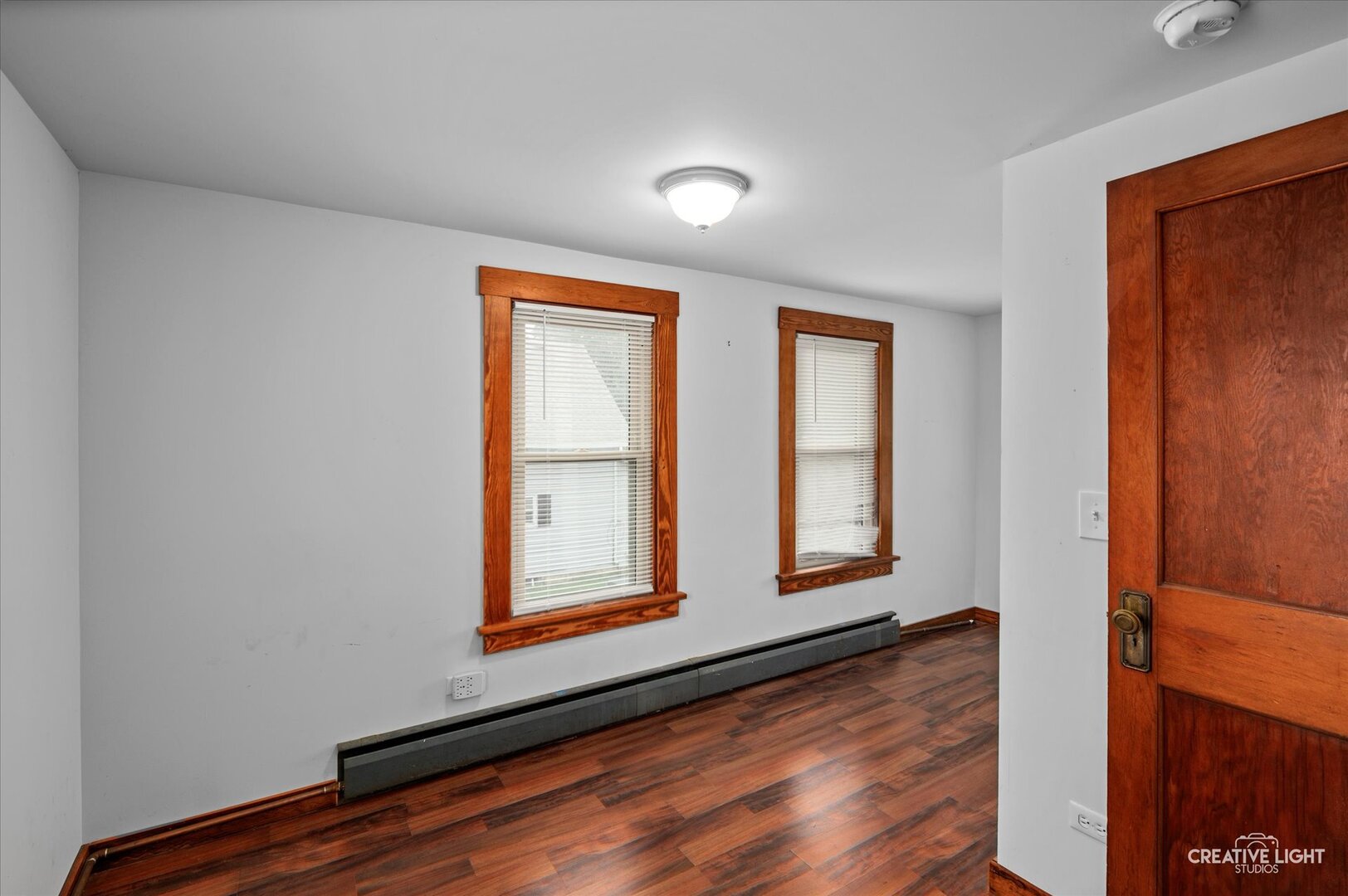 92 Maple Street Sugar Grove, IL 60554 - Photo 20 of 40 an empty room with wooden floor and windows