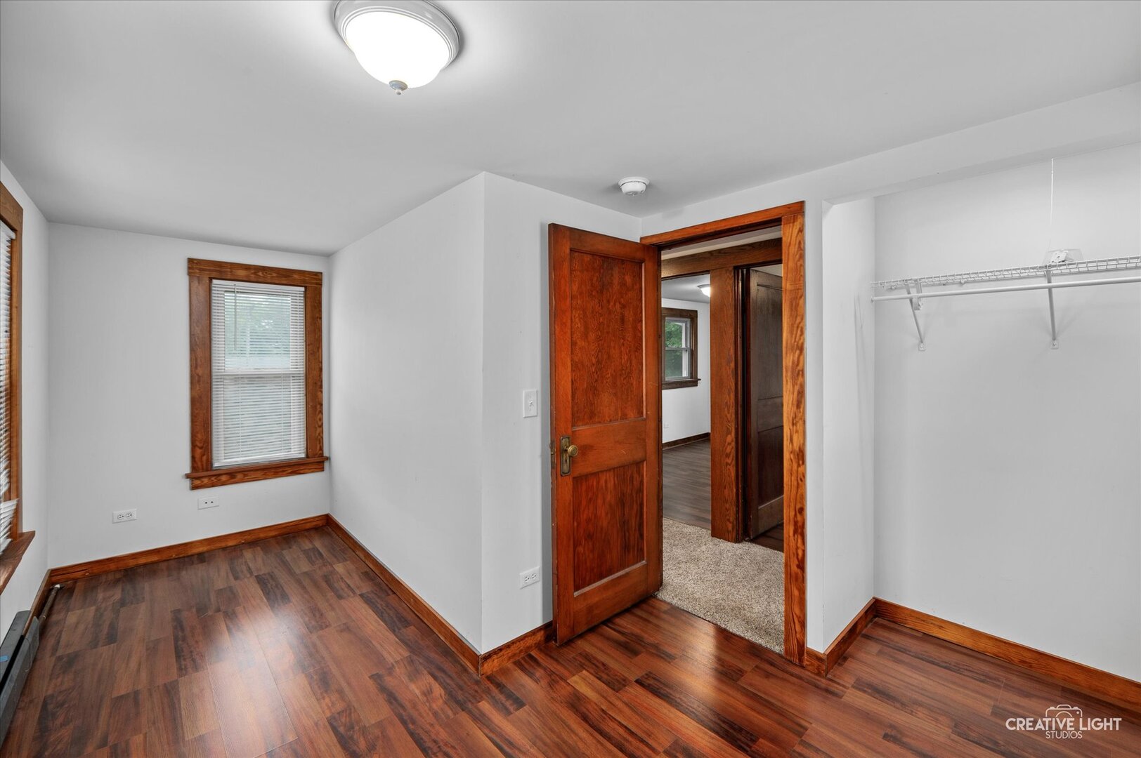92 Maple Street Sugar Grove, IL 60554 - Photo 21 of 40 an empty room with wooden floor and a window