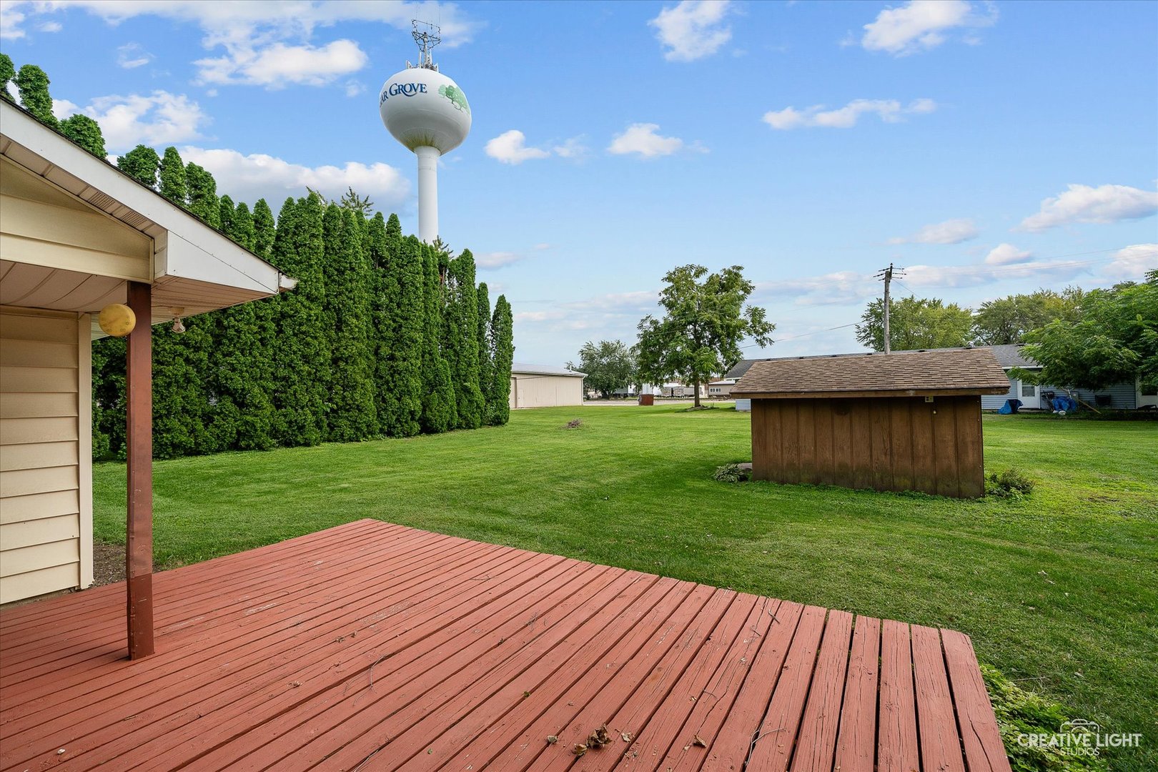 92 Maple Street Sugar Grove, IL 60554 - Photo 23 of 40 a view of a backyard with wooden floor
