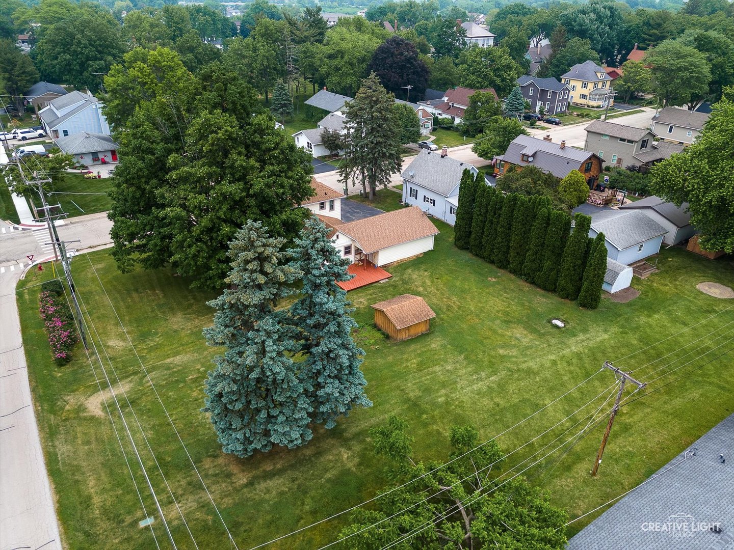 92 Maple Street Sugar Grove, IL 60554 - Photo 31 of 40 a view of a table chairs and garden