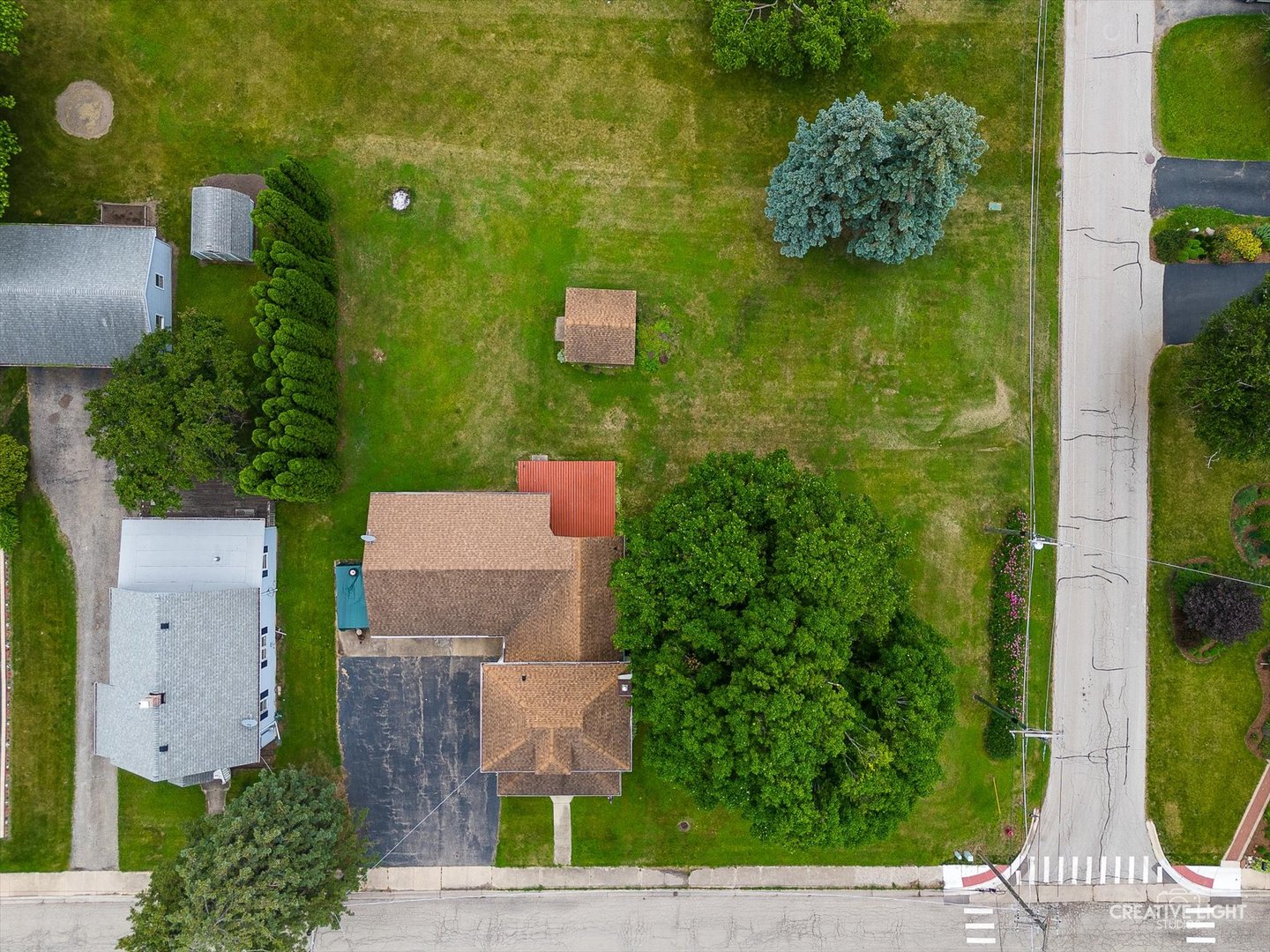 92 Maple Street Sugar Grove, IL 60554 - Photo 32 of 40 an aerial view of residential house with outdoor space and trees all around