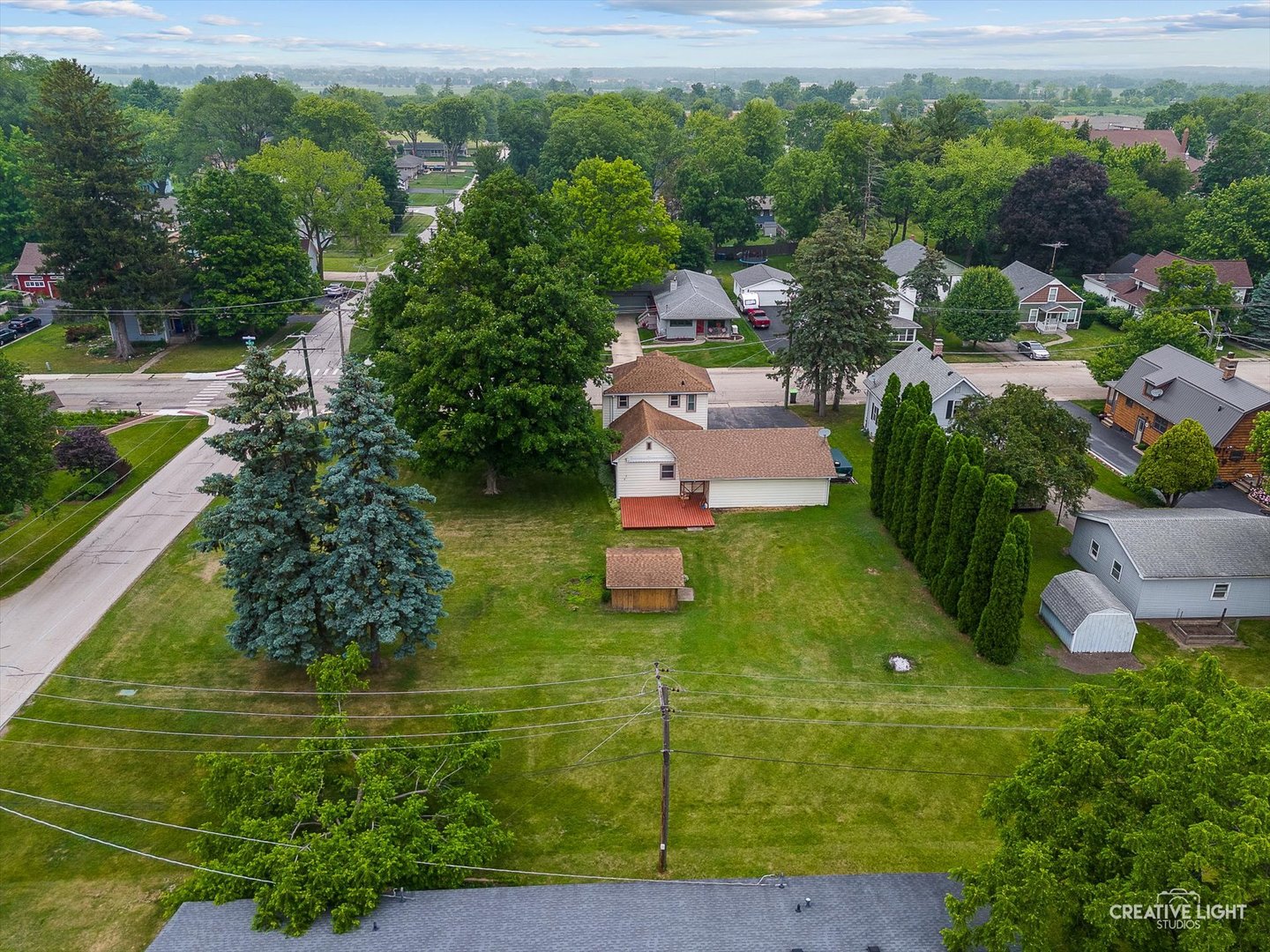 92 Maple Street Sugar Grove, IL 60554 - Photo 33 of 40 an aerial view of a house with a garden