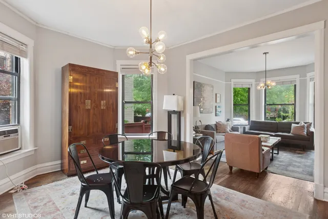a view of a dining room with furniture window and outside view